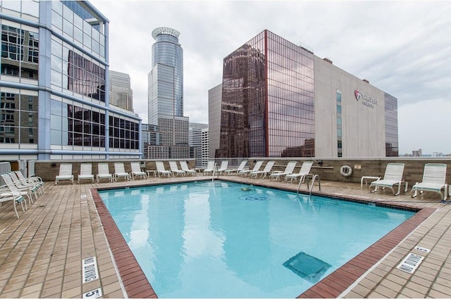 community pool with a skyline view