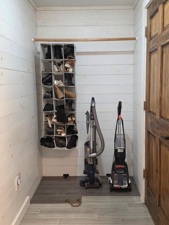 detailed view of wood finished floors and wooden walls