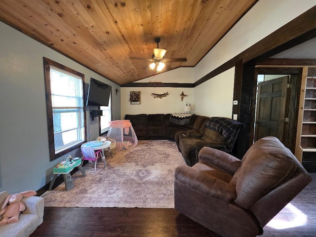 living area featuring wood finished floors, vaulted ceiling, wood ceiling, and a ceiling fan