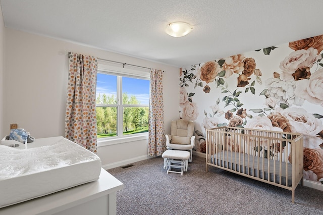 carpeted bedroom with baseboards