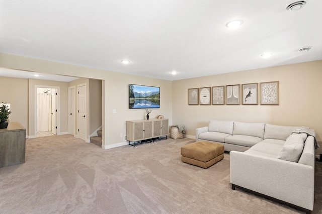 living room with light colored carpet, stairs, recessed lighting, and baseboards
