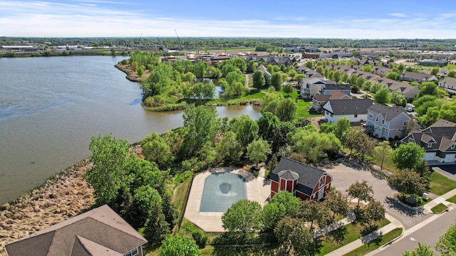 aerial perspective of suburban area featuring a large body of water