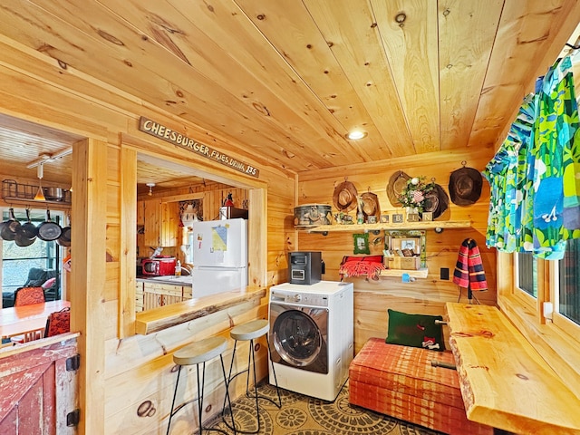 washroom with washer / dryer, wood ceiling, wooden walls, and recessed lighting