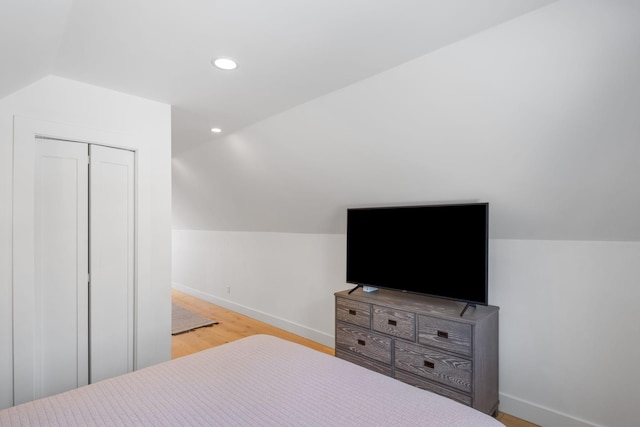 4898 County Road 6, Independence, MN 55359 - bedroom with lofted ceiling, baseboards, wood finished floors, a closet, and recessed lighting
