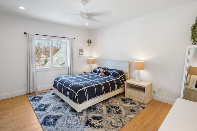 4898 County Road 6, Independence, MN 55359 - bedroom featuring wood finished floors, baseboards, recessed lighting, and a ceiling fan