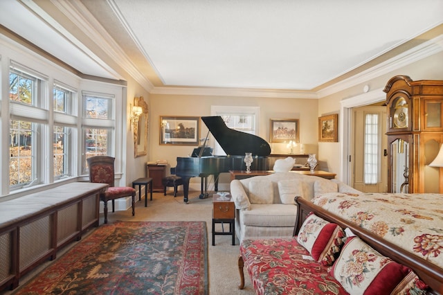 bedroom with carpet floors and crown molding