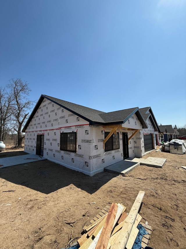 6809 Hamilton Park NW Unit 11, Bemidji, MN 56601 - property in mid-construction featuring roof with shingles