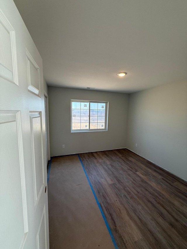 6809 Hamilton Park NW Unit 11, Bemidji, MN 56601 - empty room featuring dark wood finished floors and recessed lighting