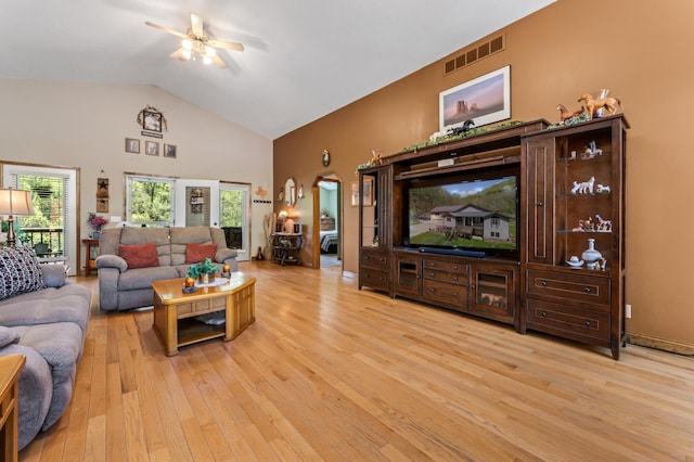 23677 County Road 23, Winona, MN 55987 - living room featuring ceiling fan, light wood-style floors, and high vaulted ceiling