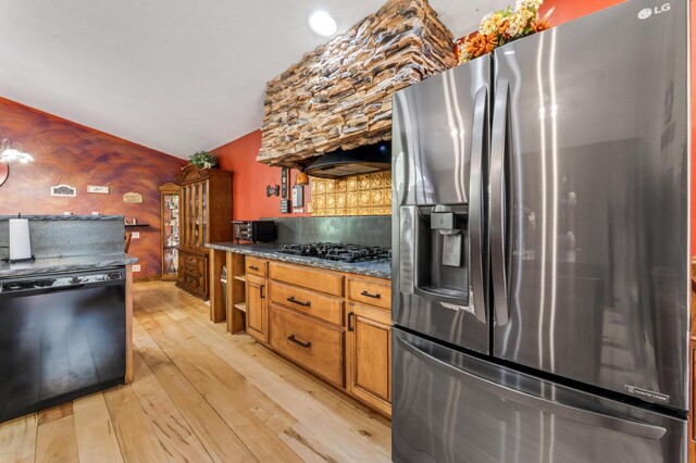 23677 County Road 23, Winona, MN 55987 - kitchen with stainless steel fridge with ice dispenser, black dishwasher, light wood-type flooring, gas stovetop, and brown cabinetry