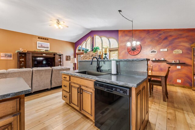 23677 County Road 23, Winona, MN 55987 - kitchen featuring black dishwasher, a sink, light wood-style flooring, brown cabinets, and lofted ceiling