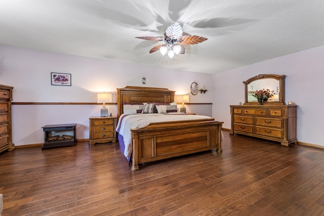 23677 County Road 23, Winona, MN 55987 - bedroom with dark wood-type flooring, baseboards, and ceiling fan