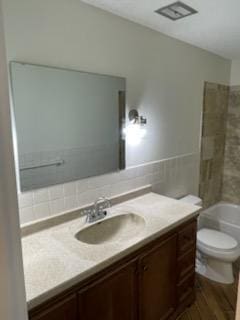 7412 22nd St Unit 204, Saint Louis Park, MN 55426 - full bath with vanity, toilet, and wood finished floors