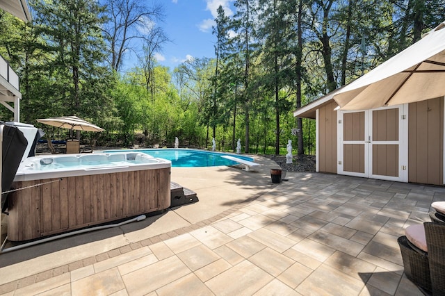 2209 Indian Rd W, Minnetonka, MN 55305 - swimming pool featuring a diving board, a patio area, view of scattered trees, and a hot tub