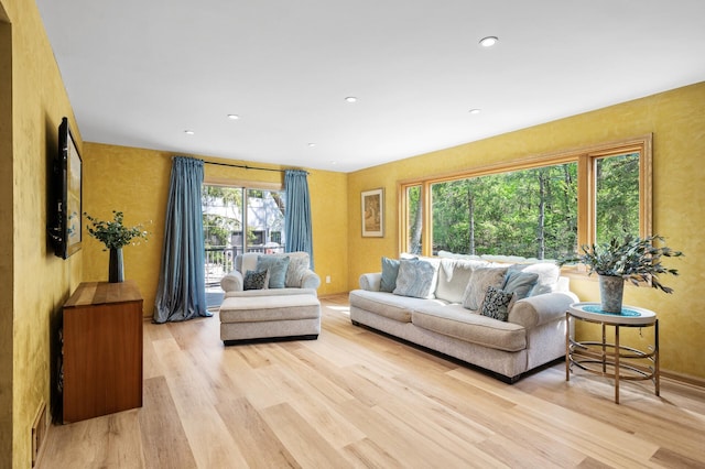 2209 Indian Rd W, Minnetonka, MN 55305 - living room with light wood-style flooring, recessed lighting, and baseboards