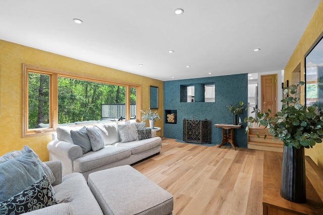 2209 Indian Rd W, Minnetonka, MN 55305 - living area featuring light wood-type flooring, recessed lighting, and a fireplace