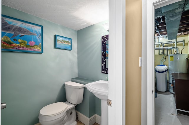 2209 Indian Rd W, Minnetonka, MN 55305 - bathroom featuring toilet, water heater, and a textured ceiling
