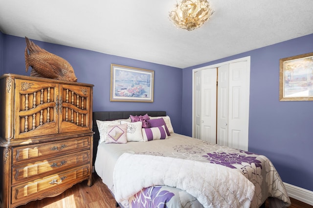 2209 Indian Rd W, Minnetonka, MN 55305 - bedroom with wood finished floors and a closet