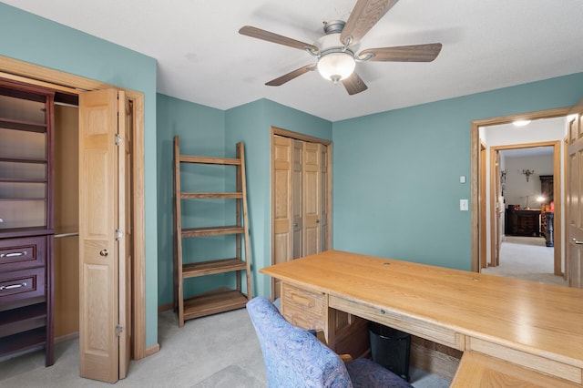 2209 Indian Rd W, Minnetonka, MN 55305 - office area featuring light carpet, a ceiling fan, and baseboards