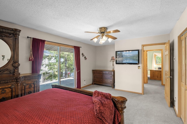 2209 Indian Rd W, Minnetonka, MN 55305 - bedroom with access to exterior, light carpet, a textured ceiling, baseboards, and a ceiling fan