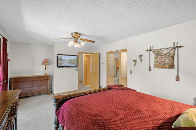 2209 Indian Rd W, Minnetonka, MN 55305 - bedroom with carpet flooring, a ceiling fan, and a textured ceiling