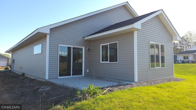 3137 Zuni Way NW, Anoka, MN 55303 - rear view of house featuring a patio area and a yard