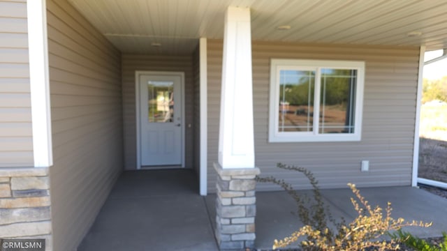 3137 Zuni Way NW, Anoka, MN 55303 - property entrance featuring stone siding