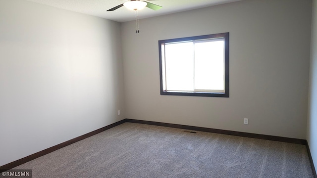 3137 Zuni Way NW, Anoka, MN 55303 - carpeted spare room featuring ceiling fan and baseboards