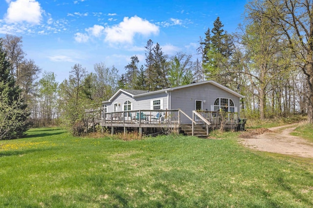 7210 79th Ave SW, Staples, MN 56479 - rear view of property featuring a yard and a wooden deck