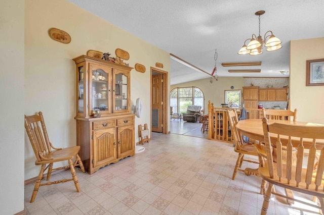 7210 79th Ave SW, Staples, MN 56479 - dining room with vaulted ceiling, a chandelier, and light flooring