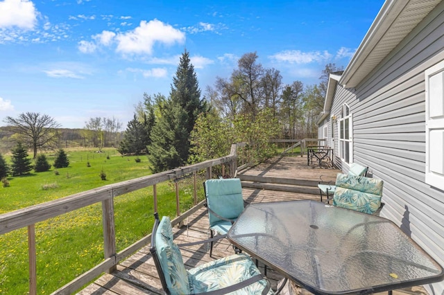 7210 79th Ave SW, Staples, MN 56479 - deck with outdoor dining space and a yard