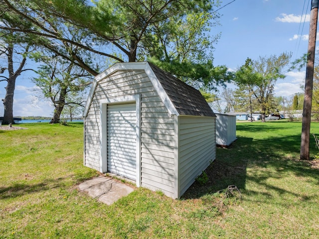 view of shed featuring a water view
