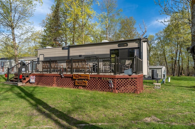 21588 Gull Lake Loop Rd NE Unit 83, Hagali Twp, MN 56683 - rear view of house featuring a lawn and a deck