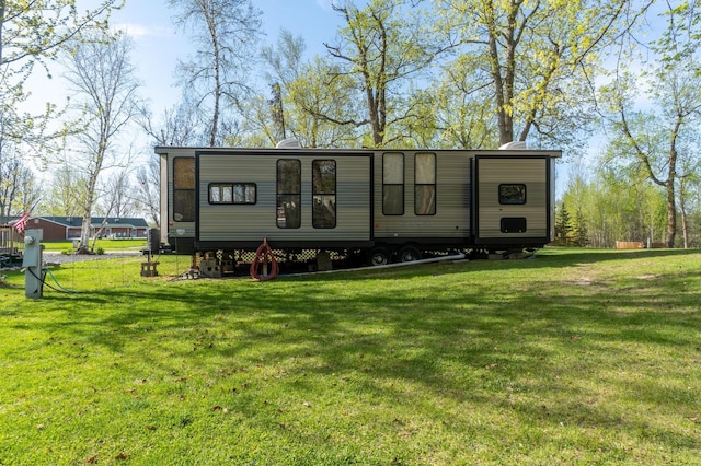 21588 Gull Lake Loop Rd NE Unit 83, Hagali Twp, MN 56683 - back of house with a lawn