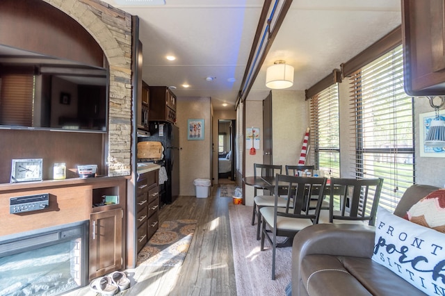 21588 Gull Lake Loop Rd NE Unit 83, Hagali Twp, MN 56683 - dining space with wood finished floors, plenty of natural light, and recessed lighting