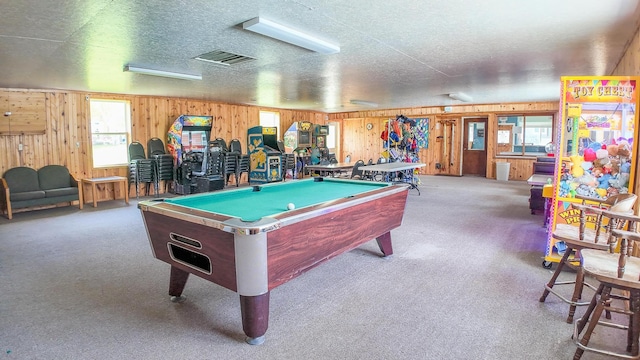 21588 Gull Lake Loop Rd NE Unit 83, Hagali Twp, MN 56683 - playroom featuring wood walls, billiards table, healthy amount of natural light, carpet, and a textured ceiling