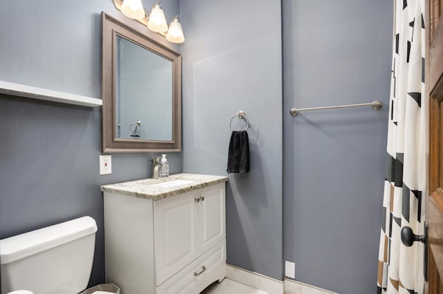 635 Grand Ave Unit 4, Saint Paul, MN 55105 - bathroom with toilet and vanity