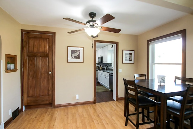 340 5th Ave SW, Hutchinson, MN 55350 - dining space featuring light wood-style floors and ceiling fan