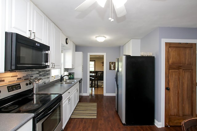 340 5th Ave SW, Hutchinson, MN 55350 - kitchen featuring appliances with stainless steel finishes, dark wood-style floors, white cabinetry, backsplash, and ceiling fan
