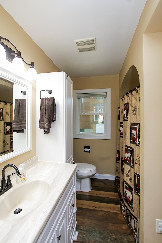 340 5th Ave SW, Hutchinson, MN 55350 - full bathroom with vanity and wood finished floors