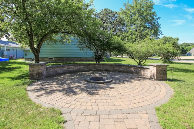 340 5th Ave SW, Hutchinson, MN 55350 - view of patio / terrace featuring an outdoor fire pit