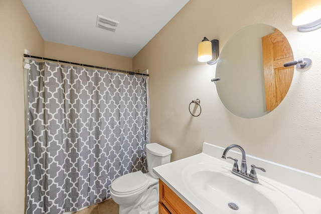 25100 Lincoln Dr NE, Athens Twp, MN 55040 - bathroom featuring toilet, vanity, and curtained shower