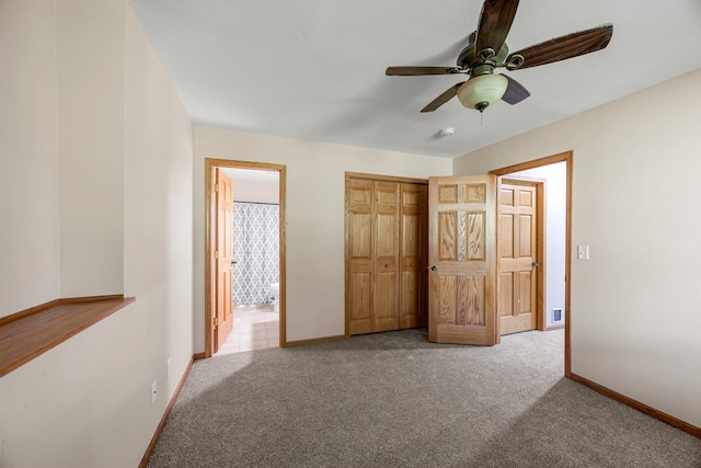 25100 Lincoln Dr NE, Athens Twp, MN 55040 - unfurnished bedroom featuring carpet flooring, baseboards, ensuite bath, and a closet
