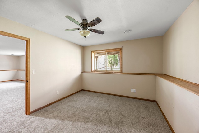 25100 Lincoln Dr NE, Athens Twp, MN 55040 - unfurnished room with carpet flooring, a ceiling fan, and baseboards