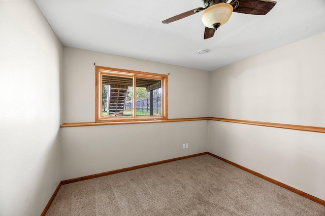 25100 Lincoln Dr NE, Athens Twp, MN 55040 - empty room featuring carpet flooring, baseboards, and a ceiling fan