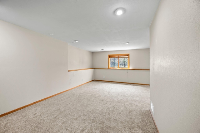 25100 Lincoln Dr NE, Athens Twp, MN 55040 - empty room featuring carpet flooring and baseboards