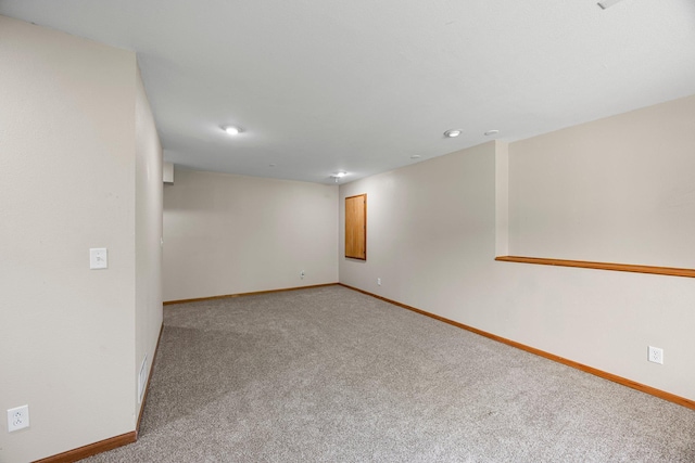 25100 Lincoln Dr NE, Athens Twp, MN 55040 - spare room featuring carpet floors, baseboards, and recessed lighting