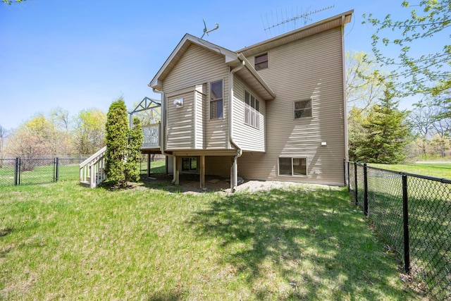 25100 Lincoln Dr NE, Athens Twp, MN 55040 - rear view of house with a wooden deck and stairs