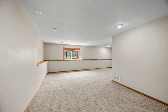 25100 Lincoln Dr NE, Athens Twp, MN 55040 - spare room featuring carpet, baseboards, and recessed lighting