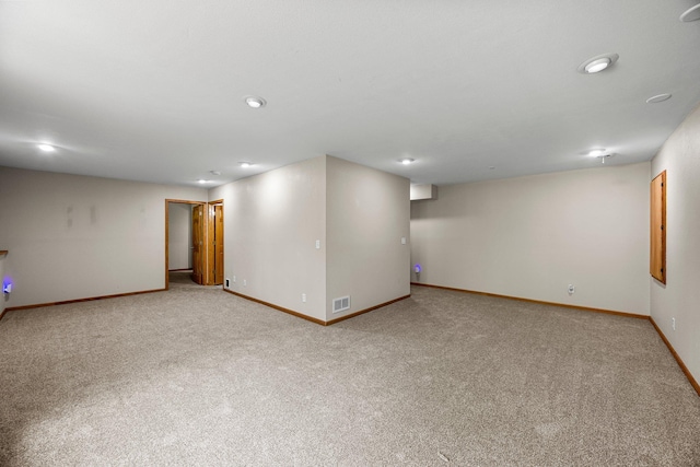 25100 Lincoln Dr NE, Athens Twp, MN 55040 - finished below grade area with carpet flooring, baseboards, and recessed lighting